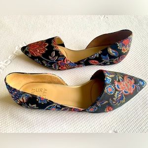 Naturalized size 10 black flats with floral print